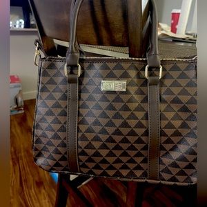 Hawaii's finest tan & brown Polynesian triangles crossbody